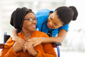 young doctor with an elderly patient at the nursing home
